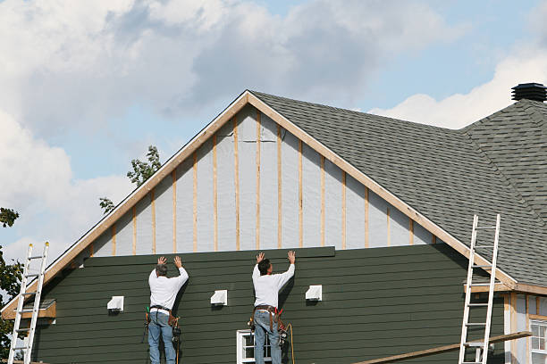 Professional Wood Siding technician working in Newtonville, MA
